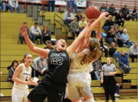  ?? AUSTIN HERTZOG - DIGITAL FIRST MEDIA ?? Methacton’s Abby Penjuke battles for a rebound with Spring-Ford’s Emily Tiffan during their PAC semifinal Saturday at Boyertown.
