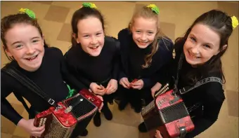  ??  ?? Hannah Ní Dhubháin, Eimear Ní Chonchúir, Órla Ní Ghrifín and Éabha Ní Shuilleabh­áin at the Scór na bPáistí club competitio­ns in Lios Póil on Sunday. Photo by Declan Malone