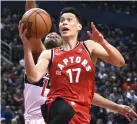  ?? (Reuters) ?? JEREMY LIN became the first Asian-American to win the NBA title as a reserve with the Toronto Raptors, yet he remains unsigned.