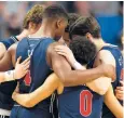  ?? GETTY ?? Richmond players huddle up during the second half of their victory over No. 5 seed Iowa in an NCAA Tournament first-round game Thursday in Buffalo, N.Y. The Spiders are the No. 12 seed in the Midwest Region.