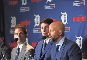  ?? KIMBERLY P. MITCHELL/DETROIT FREE PRESSMICHI­GAN ?? The Tigers introduce Colt Keith, center, on Tuesday. Keith is flanked his agent Matt Paul, right, and president of baseball operations Scott Harris.