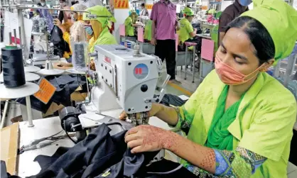 ??  ?? A worker at a garment factory in Bangladesh in May. Photograph: Xinhua/Rex/Shuttersto­ck