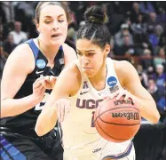  ?? John Carl D'Annibale / Albany Times Union ?? UConn guard Kia Nurse drives past Duke’s Rebecca Greenwell during the Huskies’ 72-59 victory in the NCAA Tournament regional semifinals at the Times Union Center in Albany, N.Y. on Saturday.