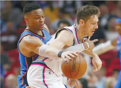  ?? AP FOTO ?? NAILED IT. Russell Westbrook and the rest of the Oklahoma City Thunder clinched a slot to the playoffs after beating Miami despite a slow start.