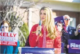  ?? MICHAEL HOLAHAN AP ?? Sen. Kelly Loeff ler, R-Ga., campaigns in Augusta, Ga., on Monday. She said she will vote against certifying the presidenti­al election results.