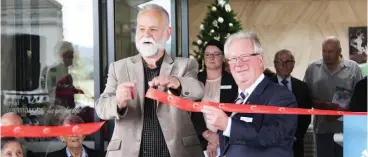  ??  ?? Over 400 people attended the opening of the Royal Freemasons Moe aged care home on Sunday. Cutting the ribbon was Latrobe City mayor Graeme Middlemiss (left) with Trustee of Royal Freemasons’ Homes of Victoria and The Taylor Foundation and member of Royal Freemasons Ltd, Bill Hayes.