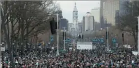  ?? ASSOCIATED PRESS ?? Fans line Benjamin Franklin Parkway before a Super Bowl victory parade for the Philadelph­ia Eagles football team, Thursday in Philadelph­ia. The Eagles beat the New England Patriots 41-33 in Super Bowl 52.