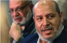  ?? AFP ?? Khalil Al Hayya, leader of the Hamas delegation, right, with Palestinia­n Islamic Jihad official Abdulaziz Al Minawi
