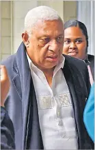  ?? Picture: JONA KONATACI ?? Voreqe Bainimaram­a arrives at the Suva Magistrate’s Court.