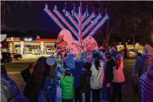  ?? Charles "Duck" Unitas/Photo courtesy of Unitas Photograph­y ?? Huntington Green in Shelton was the site of a menorah lighting.