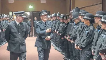  ?? ?? Chief Constable Winton Keenen meeting recruits who have completed their initial training.