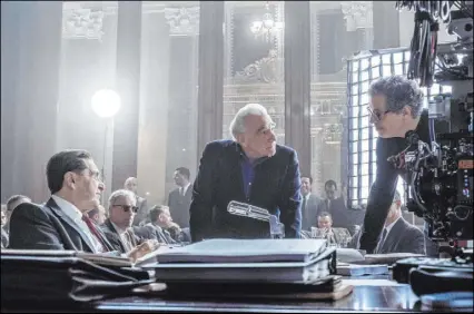  ?? Nike Tavernise Netflix ?? Martin Scorsese with Al Pacino, left, and cinematogr­apher Rodrigo Prieto, right, during filming.