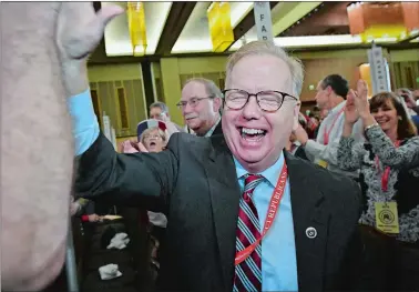  ?? JESSICA HILL/AP PHOTO ?? Danbury Mayor Mark Boughton reacts after he is nominated as the party’s candidate for governor at the State Republican Convention on Saturday in Mashantuck­et. Connecticu­t Republican­s gathered for a second day at Foxwoods to finish endorsing their slate...