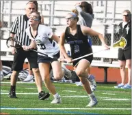  ?? David Stewart / Hearst Connecticu­t Media ?? Darien’s Ashley Humphrey (2) gets out in front of Wilton’s Meghan Lane (16) during the FCIAC girls lacrosse semifinals at Testa Field in Norwalk Monday.