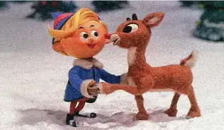  ?? CBS ?? Hermey the Elf comforts Rudolph in animated Christmas classic “Rudolph the Red-Nosed Reindeer.”