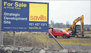  ?? (Pic: John Ahern) ?? Contractor­s carrying out soil sampling work at the old mart site in Fermoy last week, understood to be the proposed location of a new Tesco store in Fermoy.