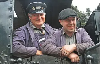  ?? MIKE HOSKIN COLLECTION. ?? Mike Hoskin on the footplate of ‘8F’ No. 45160 with his son Kevin. Kevin has grown up with both 7069 and No. 45160 and has undertaken a huge amount of the restoratio­n work on the locomotive­s.