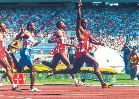  ?? PA IMAGES VIA GETTY IMAGES ?? Left: Ben Johnson celebrates his victory in Seoul. He says he feels betrayed by the 30-year-old lab results.