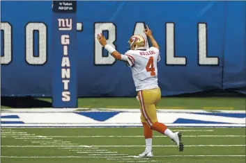  ?? ADAM HUNGER — THE ASSOCIATED PRESS ?? San Francisco 49ers quarterbac­k Nick Mullens (4) celebrates a touchdown against the Giants during their game last Sunday in East Rutherford, N.J.