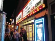  ?? NATASCIA LYPNY/OTTAWA CITIZEN ?? Viewers arrive at Mayfair Theatre on Saturday night for the 48th consecutiv­e monthly screening of the The Room.