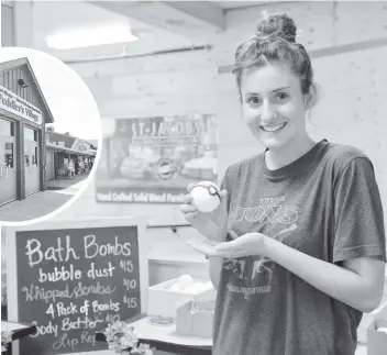  ?? [WHITNEY NEILSON / THE OBSERVER] ?? Mariah Zervos of Botanical Propaganda is back in Peddler’s Village as one of the vendors who’ve returned two months after a fire closed the building at the St. Jacobs Farmers’ Market. Most are expected to move back in on an ongoing basis.