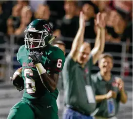  ?? Jason Fochtman ?? The Woodlands wide receiver Kesean Carter (6) returns a kickoff for a 75-yard touchdown during the third quarter of a non-district high school football game at Woodforest Bank Stadium, Friday, Sept. 22, 2017, in Shenandoah.