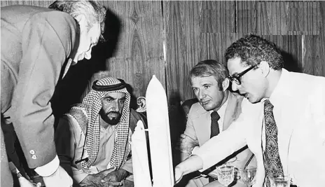  ??  ?? Sheikh Zayed, Founding Father of the UAE, is briefed by Dr Farouk El-Baz, right, who was part of America’s Apollo programme. The first spacecraft to have a soft landing on Mars was on December 2, 1971 – the day the UAE was founded