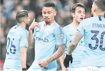  ?? - AFP photo ?? Gabriel Jesus (2nd left) scored four of Manchester City’s goals in a 9-0 thrashing of Burton Albion on Wednesday.