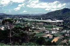  ??  ?? ABOVE LEFT: A de Havilland Vampire of 28 Squadron at RAF Sek Kong in the 1950s. ABOVE RIGHT: The Sek Kong airfield photograph­ed in the 1980s.