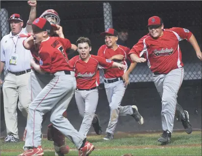  ?? File photo by Ernest A. Brown ?? If the 2017 Cumberland American state championsh­ip team needs advice on what it takes to win a New England title, they can simply talk to C.J. Davock (left), John Belisle (center) and the 2014 New England title winning CALL squad.