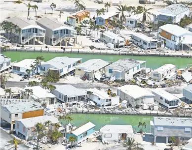  ?? JACK GRUBER, USA TODAY ?? Cudjoe Key in the lower Florida Keys took the full strength of Irma as it made landfall as a Category 4 storm early Sunday. Residents began returning to the upper islands Tuesday.