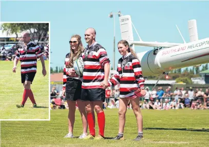  ?? PHOTOS: BEN WATERWORTH ?? Star attraction . . . Blair Vining arrives at the Blair Vining Bucket List Rugby Game by helicopter with his daughters DellaMay (left) and Lilly. Inset: Mr Vining lines up for a field goal during the game in Winton on Saturday.