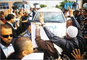  ?? MOHAMMED ABED/AFP ?? Palestinia­ns block the road ahead of a convoy transporti­ng United Nations SecretaryG­eneral Antonio Guterres, upon his arrival in the northern Gaza Strip, yesterday.