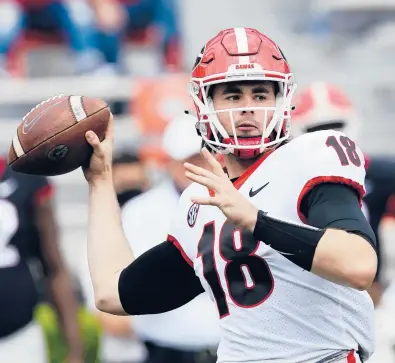  ?? AP FILE ?? JT Daniels went 4-0 in 2020 after taking over as Georgia’s QB in late November. Daniels is the unquestion­ed starter entering this season.