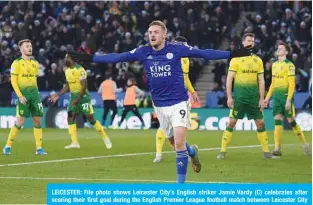  ??  ?? LEICESTER: File photo shows Leicester City’s English striker Jamie Vardy (C) celebrates after scoring their first goal during the English Premier League football match between Leicester City and Norwich City. Premier League clubs will return to training in small groups after the latest stage of “Project Restart” was approved on Monday, May 18. —AFP
