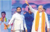  ?? ?? Union Home Minister Amit Shah and Maharashtr­a CM Eknath Shinde during a public meeting at Vasai on Monday