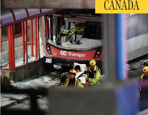  ?? JUSTIN TANG / THE CANADIAN PRESS ?? Police and first responders wheel away a victim after a double-decker city bus struck a transit shelter in central Ottawa on Friday.