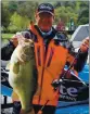  ?? FILE PHOTO ?? Charles Almassey caught this 16.3-pound bass while prefishing for the 29th annual Clear Lake Team Bass Tournament back in 2016. The lake record is 17.52 pounds.