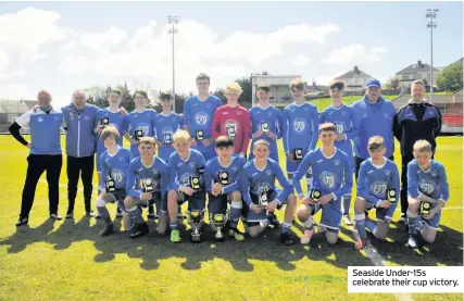  ??  ?? Seaside Under-15s celebrate their cup victory.