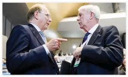  ??  ?? Craig Reedie, right, speaks with Richard McLaren who produced a report for WADA which claimed that Russia had orchestrat­ed state-sponsored doping at the 2014 Sochi Winter Olympics, during the WADA Annual Symposium in Lausanne on Monday. (AFP)