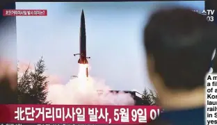  ?? AFP ?? A man watches a file footage of a North Korean missile launch at a railway station in Seoul yesterday.