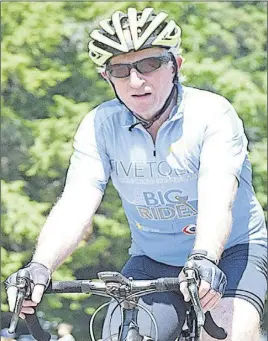  ?? FILE PHOTO ?? Truro’s Chris MacDougall cycled across Canada in memory of his son, Charlie. MacDougall started his journey in late July in Vancouver and finished in late September in St. John’s, N.L.