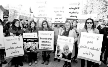  ?? — Reuters photo ?? File photo shows Moroccans gathering in front of Denmark’s embassy in Rabat to honour Ueland and Vesterager Jespersen, who were killed in Morocco, in Rabat, Morocco.