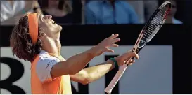  ?? Gregorio Borgia / The Associated Press ?? Alexander Zverev celebrates after beating Novak Djokovic on Sunday at the Italian Open.