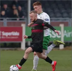  ??  ?? Jack Doherty making inroads towards the Cabinteely goal.