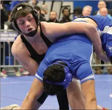  ?? JULIA MALAKIE — LOWELL SUN ?? Sidney Tildsley of Shawsheen Tech, left, won by pin over Omid Sabr of Worcester Tech in their 138-pound semifinal. He went on to win the Division 1 state title Saturday in Methuen.