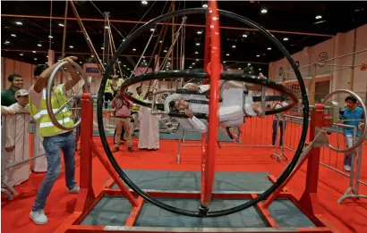  ?? Photos by Ryan Lim ?? Students participat­e in summer camp activities at the Abu Dhabi Sports Festival at Abu Dhabi National Exhibition Centre. The 54-day festival has lined up various activities for adults as well as children of all ages. —