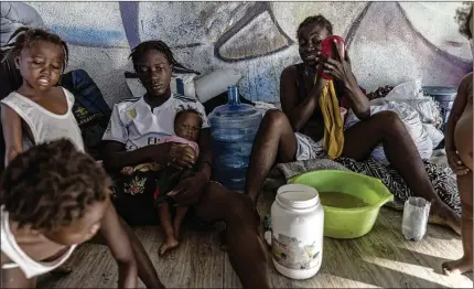  ?? NYT 2022 ?? The United Nations has described the situation in Haiti as “cataclysmi­c.” One issue is the lack of foreign aid. But with strife in Gaza, Ukraine and Sudan, money has been hard to come by. “All of us are going pretty much after the same donors,” one U.N. official said. A U.N. effort to raise $674 million for basic needs in Haiti has raised just 16% of the goal, with most of that from the United States.