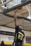  ?? PATRICK HOPKINS — THE NEWS-HERALD ?? Beachwood’s Collin Albert shoots Jan. 2 at Wickliffe. Albert scored 18 points in a 61-58 win.