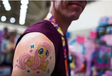  ?? — AFP ?? a man showing off his My Little Pony tattoo in Maryland, the united States.